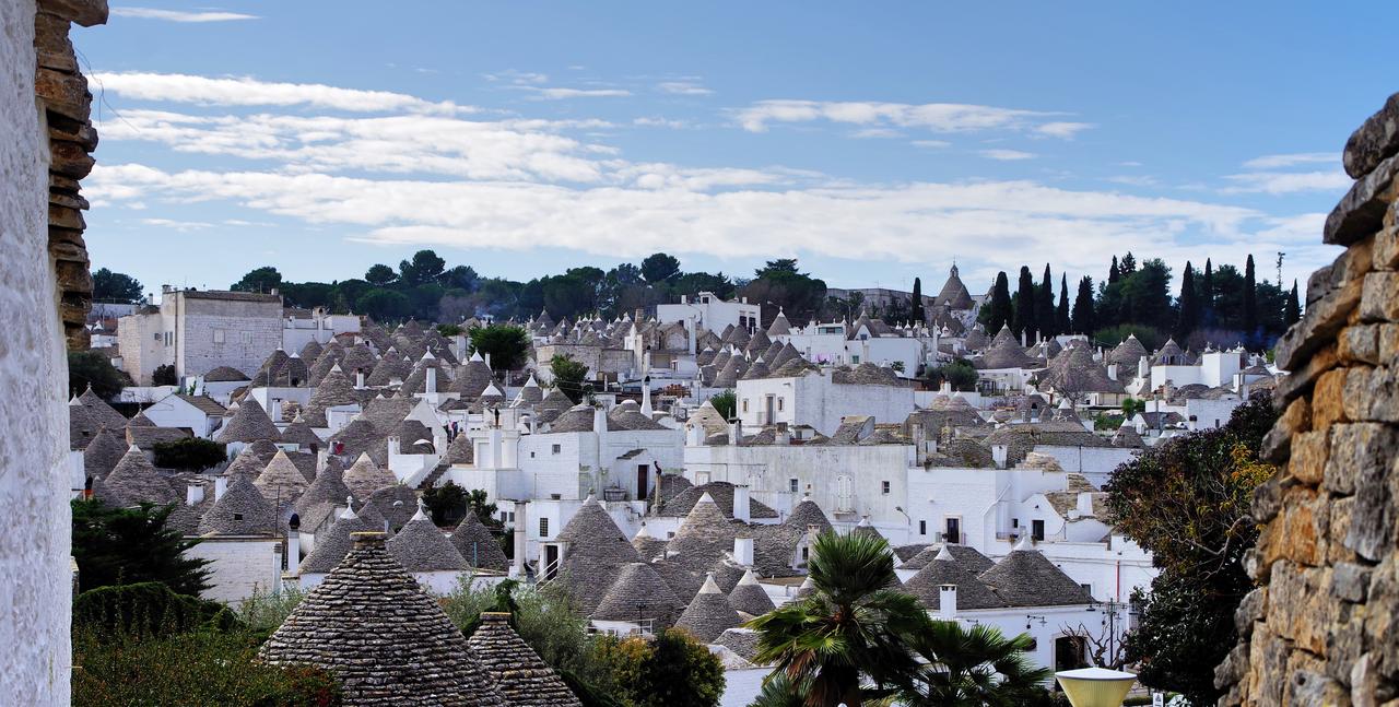 Snow-covered trulli houses in Alberobello, Italy